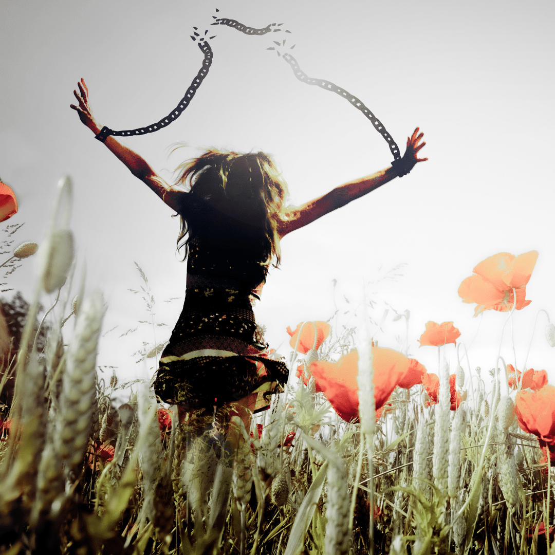 Image of a girl breaking free from handcuff chains and running through a field of flowers, symbolizing the journey to recovery from addiction
